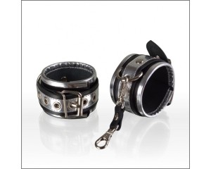 Наручники из натуральной черной кожи, с декоративной серебристой отделкой , длина 31.00см, диаметр 0.00см